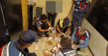 Nearly TL 2 million recovered during simultaneous operations carried out in 16 districts in Bursa province, Türkiye, Sept. 27, 2023. (AA Photo)