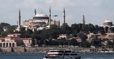 A ferry sails on the Bosphorus in front of the Hagia Sophia Grand Mosque in Istanbul, Türkiye, Sept. 16, 2023. (EPA Photo)