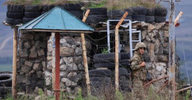 An Azerbaijani soldier stands guard at a checkpoint in Shusha, Karabakh, Azerbaijan, Sept. 23, 2023. (AFP Photo)
