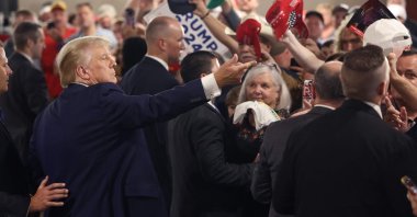 2024 Republican presidential candidate and former U.S. President Donald Trump greets guests following a "Commit To Caucus" rally at the Jackson County Fairgrounds in Maquoketa, Iowa, U.S., Sept. 20, 2023. (AFP Photo)