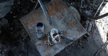 Shoes belonging to child victims are seen at the scene of the accident, in Mosul, Iraq, September 27, 2023. (AA Photo)