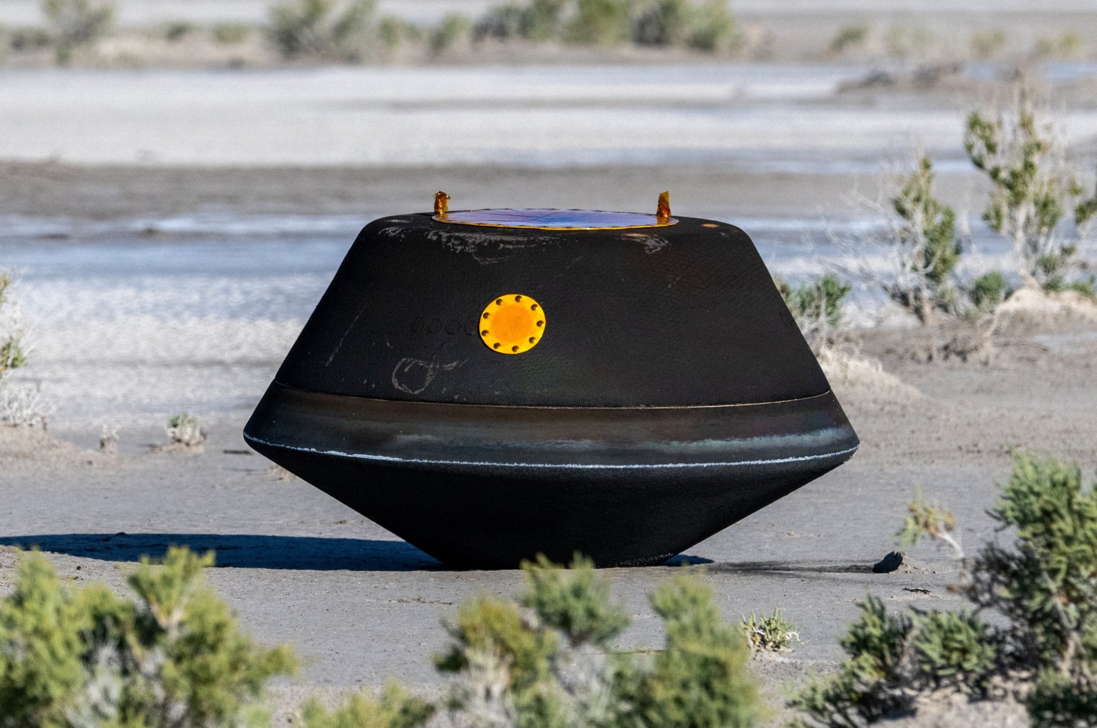 The return capsule containing a sample collected from the asteroid Bennu in October 2020 by NASA’s OSIRIS-REx spacecraft is seen shortly after touching down in the desert at the Department of Defense&#039;s Utah Test and Training Range in Dugway, Utah, U.S., Sept. 24, 2023. (Reuters Photo)