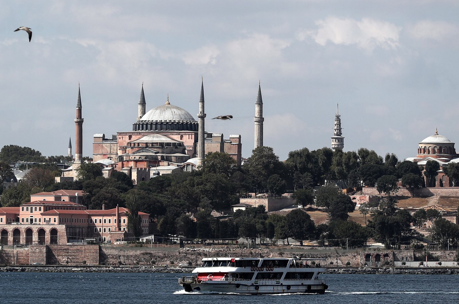 A ferry sails on the Bosphorus in front of the Hagia Sophia Grand Mosque in Istanbul, Türkiye, Sept. 16, 2023. (EPA Photo)