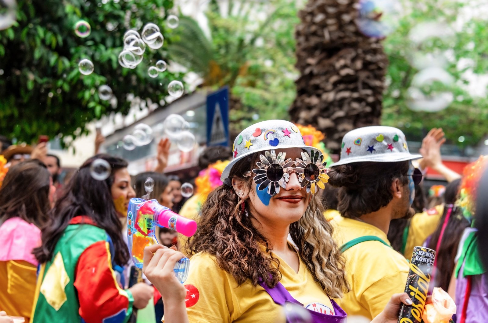 The clowns in the famous Orange Blossom Carnival parade with bubbles in the city of Adana, Türkiye. (Shutterstock Photo)