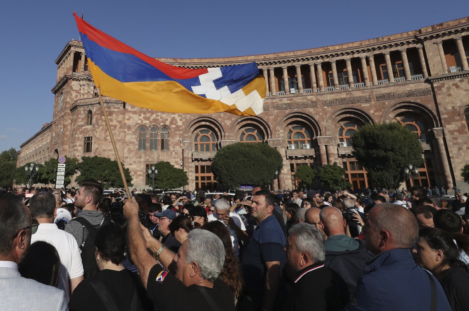 People gather at the Armenia government building to protest against Prime Minister Nikol Pashinyan in Yerevan, Armenia, Sept. 19, 2023. (AP Photo)