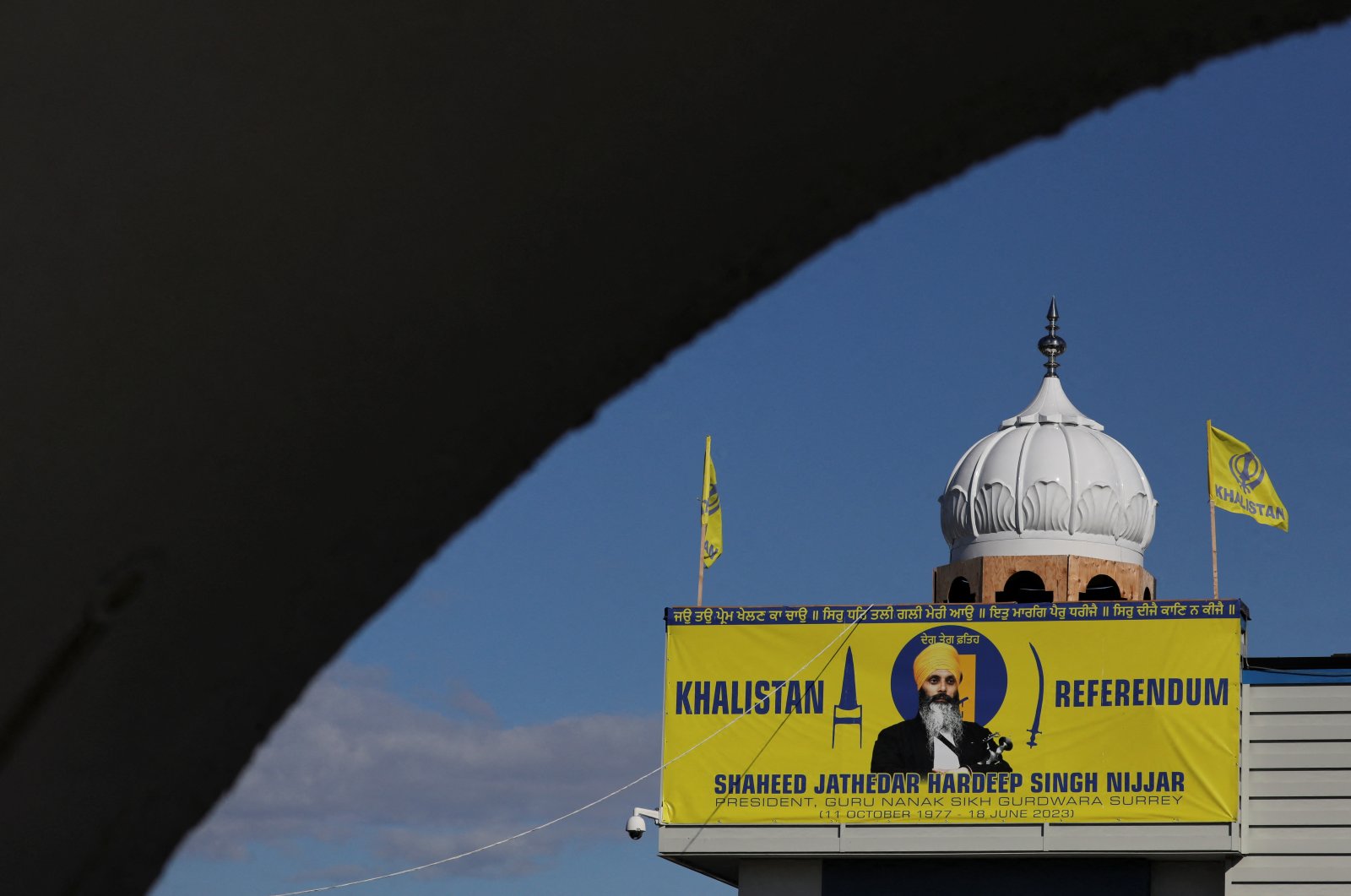 A banner with the image of Sikh leader Hardeep Singh Nijjar is seen at the Guru Nanak Sikh Gurdwara temple, in Surrey, British Columbia, Canada, Sept. 20, 2023. (Reuters Photo)