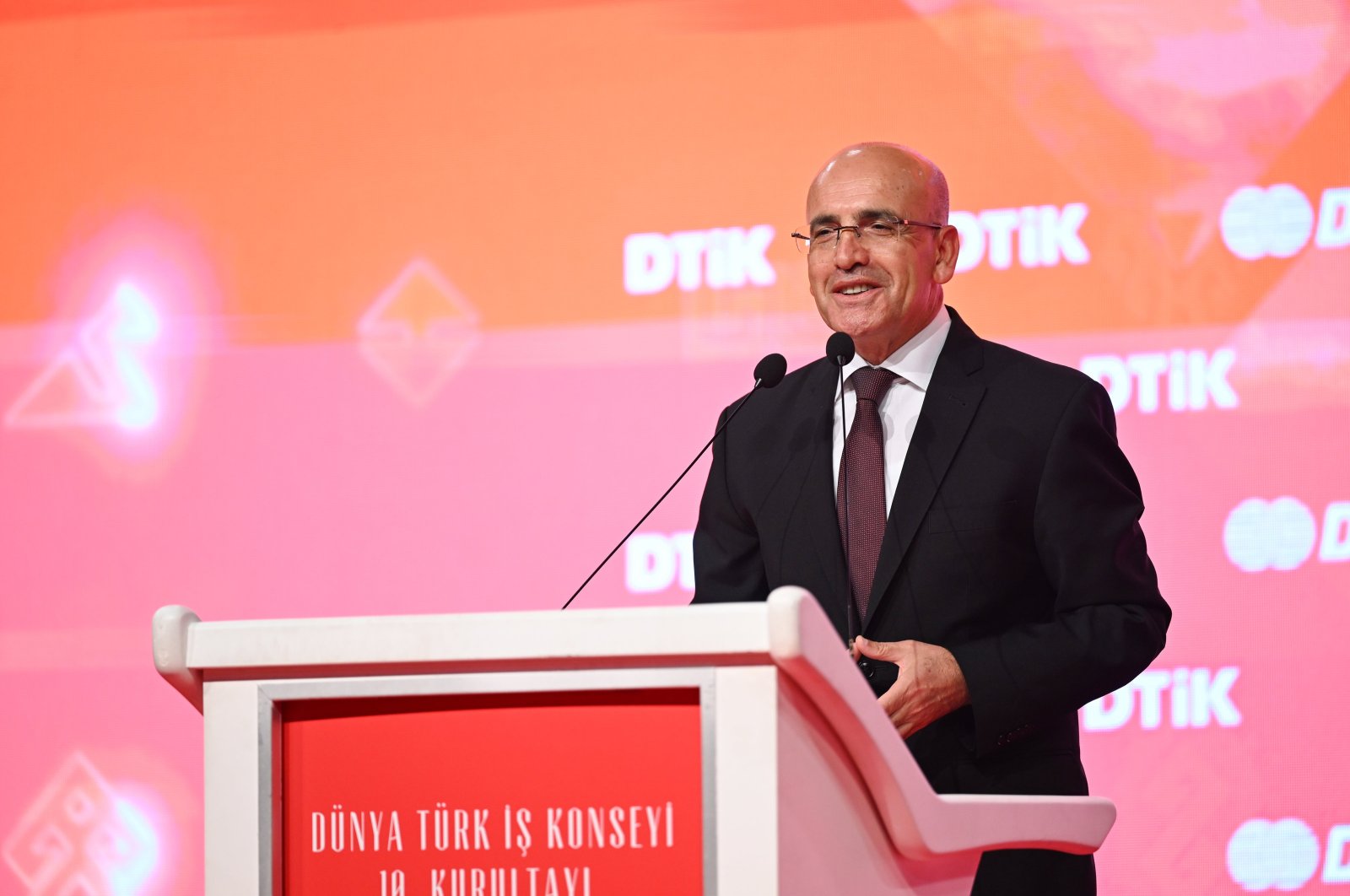 Treasury and Finance Minister Mehmet Şimşek delivers a speech during a business event in Istanbul, Türkiye, Sept. 15, 2023. (AA Photo)