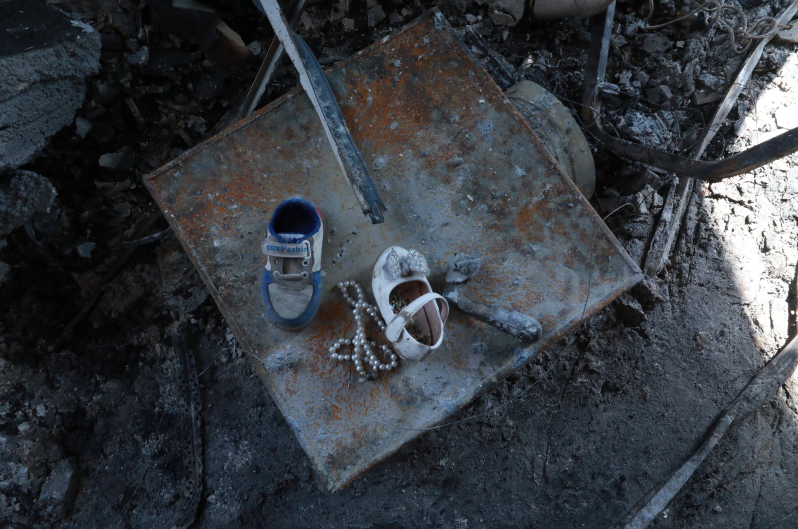 Shoes belonging to child victims are seen at the scene of the accident, in Mosul, Iraq, September 27, 2023. (AA Photo)