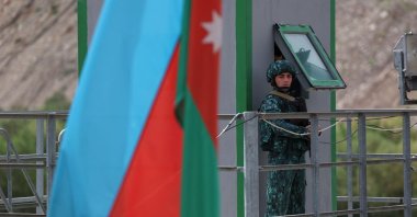 An Azerbaijan soldier stands guard at the Lachin border crossing, Karabakh, Azerbaijan, Sept. 26, 2023. (AFP Photo)