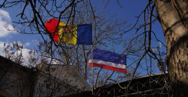 Moldovan and Gagauz flag fly on a building, Comrat, Moldova, March 17, 2022. (Getty Images Photo)