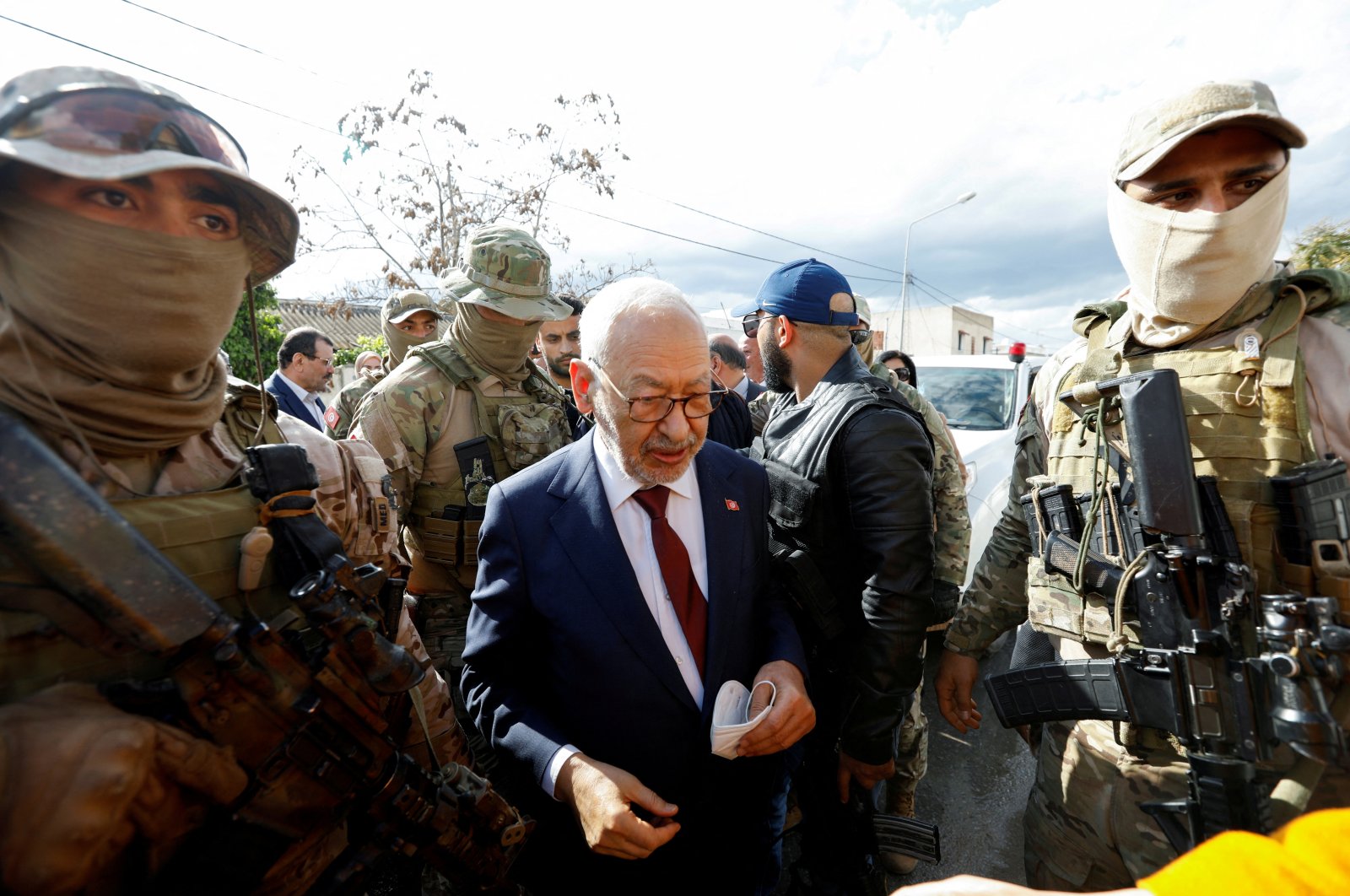Tunisia&#039;s Rached Ghannouchi, head of the Ennahda party, is surrounded by presidential guard members in Tunis, Tunisia, April 1, 2022. (Reuters Photo)