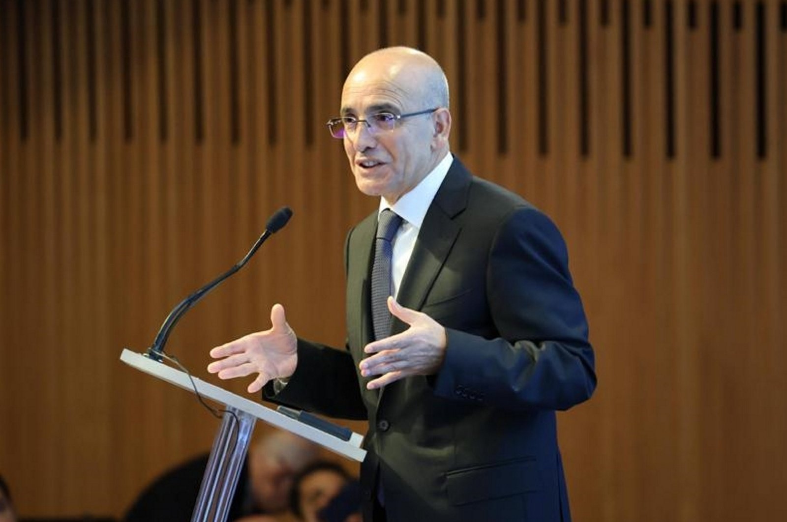 Treasury and Finance Minister Mehmet Şimşek delivers a speech during an investor meeting in New York, U.S., Sept. 19, 2023. (AA Photo)