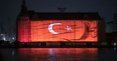 The Turkish flag is projected on the historic Haydarpaşa Station, Istanbul, Türkiye, April 20, 2023. (Getty Images Photo)