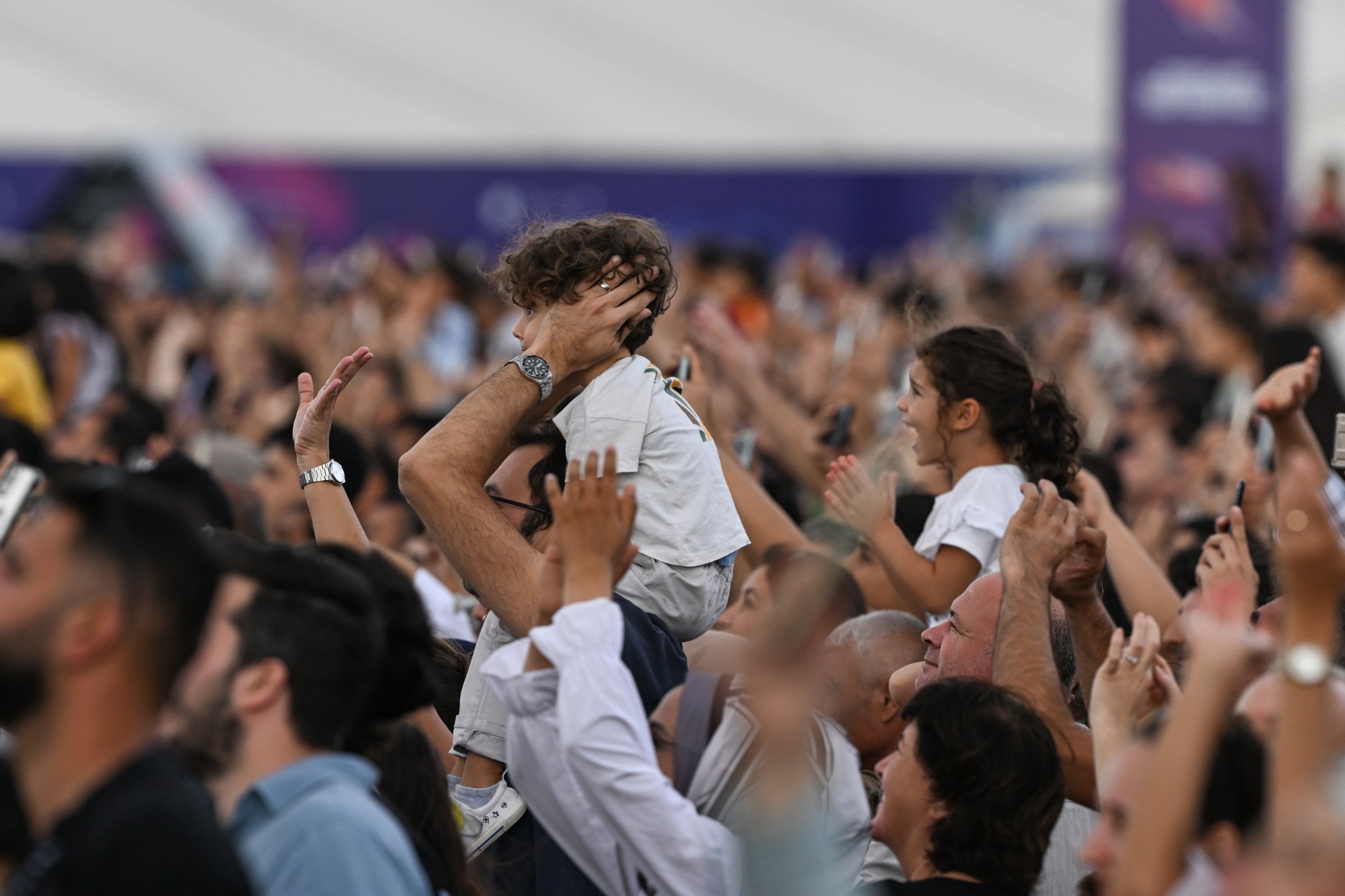 Visitors watching the national acrobatics team performance during Teknofest Izmir, western Türkiye, Sept. 30, 2023. (AA Photo)