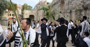 Orthodox Jews pray at the Lions' Gate, the entrance to the Temple Mount complex and Al Aqsa Mosque, occupied East Jerusalem, Palestine, Oct. 1, 2023. (EPA Photo)