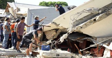 Rescue workers search for survivors amid debris after the roof of a church collapsed in Ciudad Madero, Mexico, Oct. 1, 2023. (AP Photo)