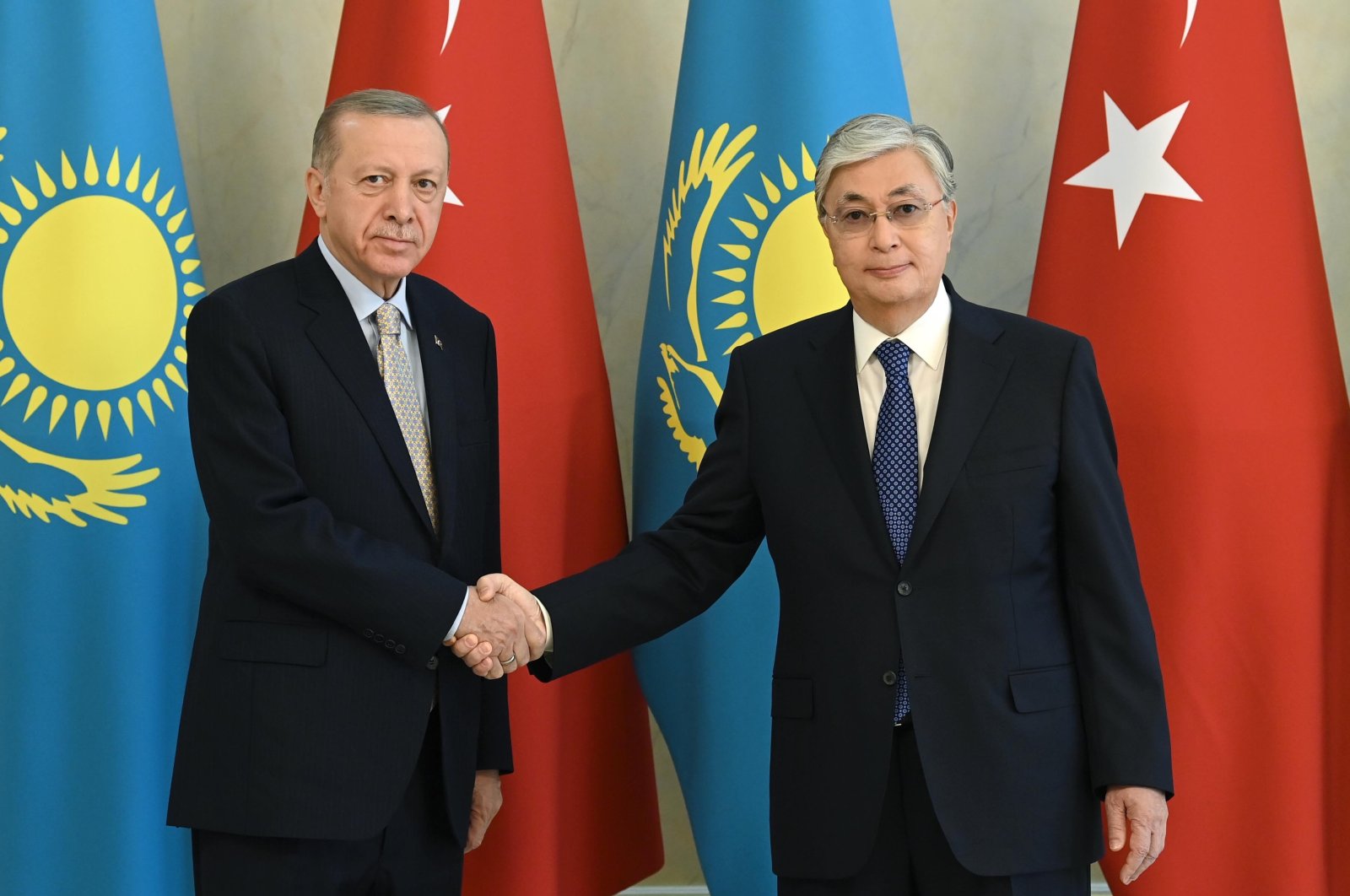 President Erdoğan shakes hands with President Tokayev during a meeting in Astana, Kazakhstan, October 14, 2022. (İHA Photo) 
