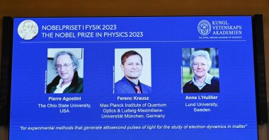 (L-R) A screen shows this year&#039;s laureates U.S.-based physicist Pierre Agostini, Hungarian-Austrian physicist and French physicist Anne Luillier during the announcement of the winners of the 2023 Nobel Prize in Physics at Royal Swedish Academy of Sciences in Stockholm, Sweden, Oct. 3, 2023. (AFP Photo)