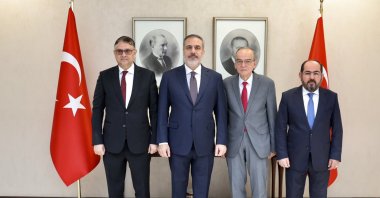 Foreign Minister Hakan Fidan and Syrian opposition leaders pose for a picture in Ankara, Oct. 3, 2023. (AA Photo)