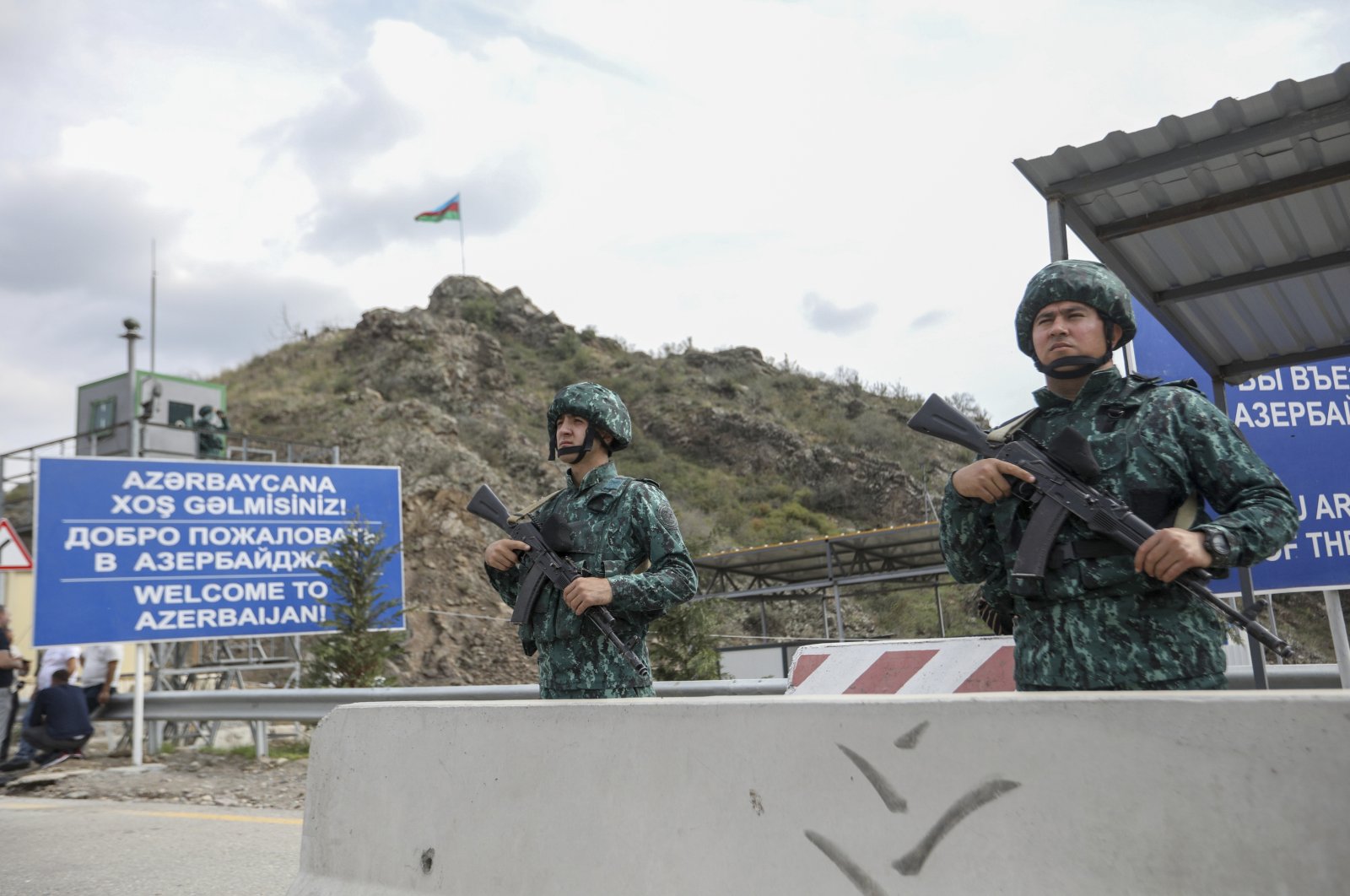 Azerbaijani servicepeople guard the Lachin checkpoint on the in Azerbaijan, Oct. 1, 2023. (AP Photo)
