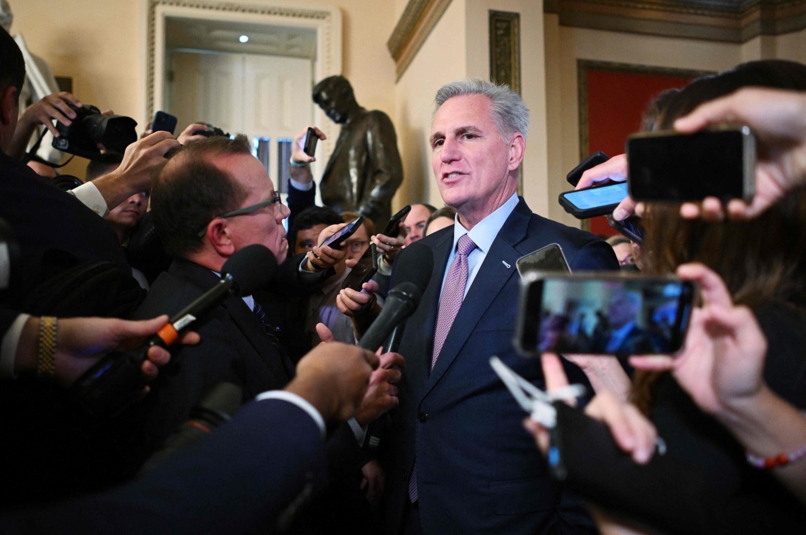 Speaker of the House Kevin McCarthy, Republican of California, talks to reporters, outside his office at the U.S. Capitol in Washington, D.C. Oct. 3, 2023. (AFP Photo)