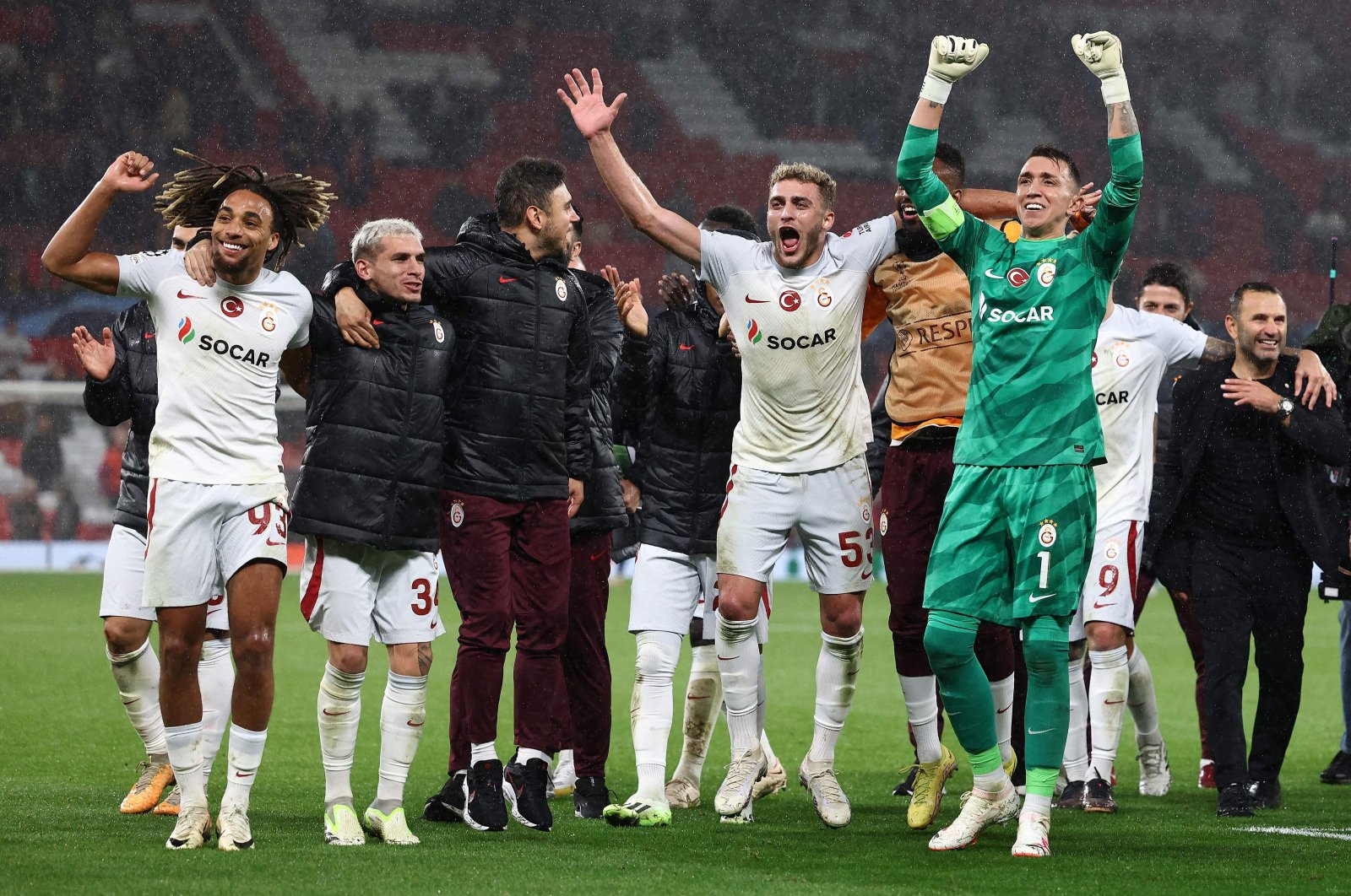  Galatasaray players celebrate after the UEFA Champions League Group A football match between Manchester United and Galatasaray at Old Trafford stadium in Manchester, north west England, on Oct.3, 2023. (AFP Photo)