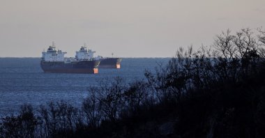 Crude oil tankers, including the Troitsky Bridge vessel, lie at anchor in Nakhodka Bay near the port city of Nakhodka, Russia, Dec. 4, 2022. (Reuters Photo)