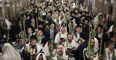 Orthodox Jews pray near the gate leading to Al-Aqsa Mosque complex, East Jerusalem, occupied Palestine, Oct. 4, 2023. (EPA Photo)