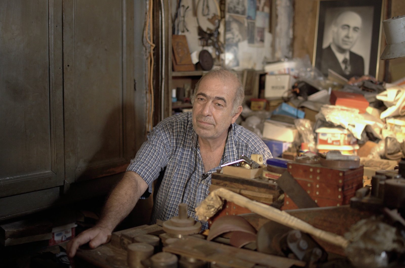 Bedros Muradyan, the last "hakkak" (engraver) in Istanbul, poses during the interview, Istanbul, Türkiye, Sept. 27, 2023. (Photo by Eyüp Kaymak, Serkan Hervenik)