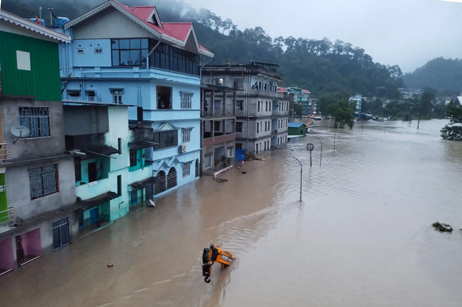 A view of a flooded street in Lachen Valley, Sikkim state, northeast India, Oct. 4, 2023. (AFP Photo)