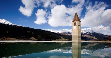 The bell tower in Reschense, Curon Venosta, Italy, April 23, 2006. (Getty Images Photo)