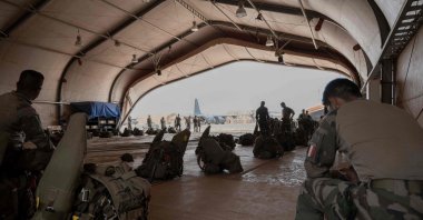 French and Nigerien soldiers prepare for a mission at the French BAP air base, in Niamey, Niger, May 14, 2023. (AFP Photo)