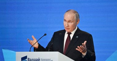 Russian President Vladimir Putin delivers a speech at the 20th Annual Meeting of the Valdai Discussion Club in Sochi, Russia, Oct. 5, 2023. (Sputnik via Reuters)