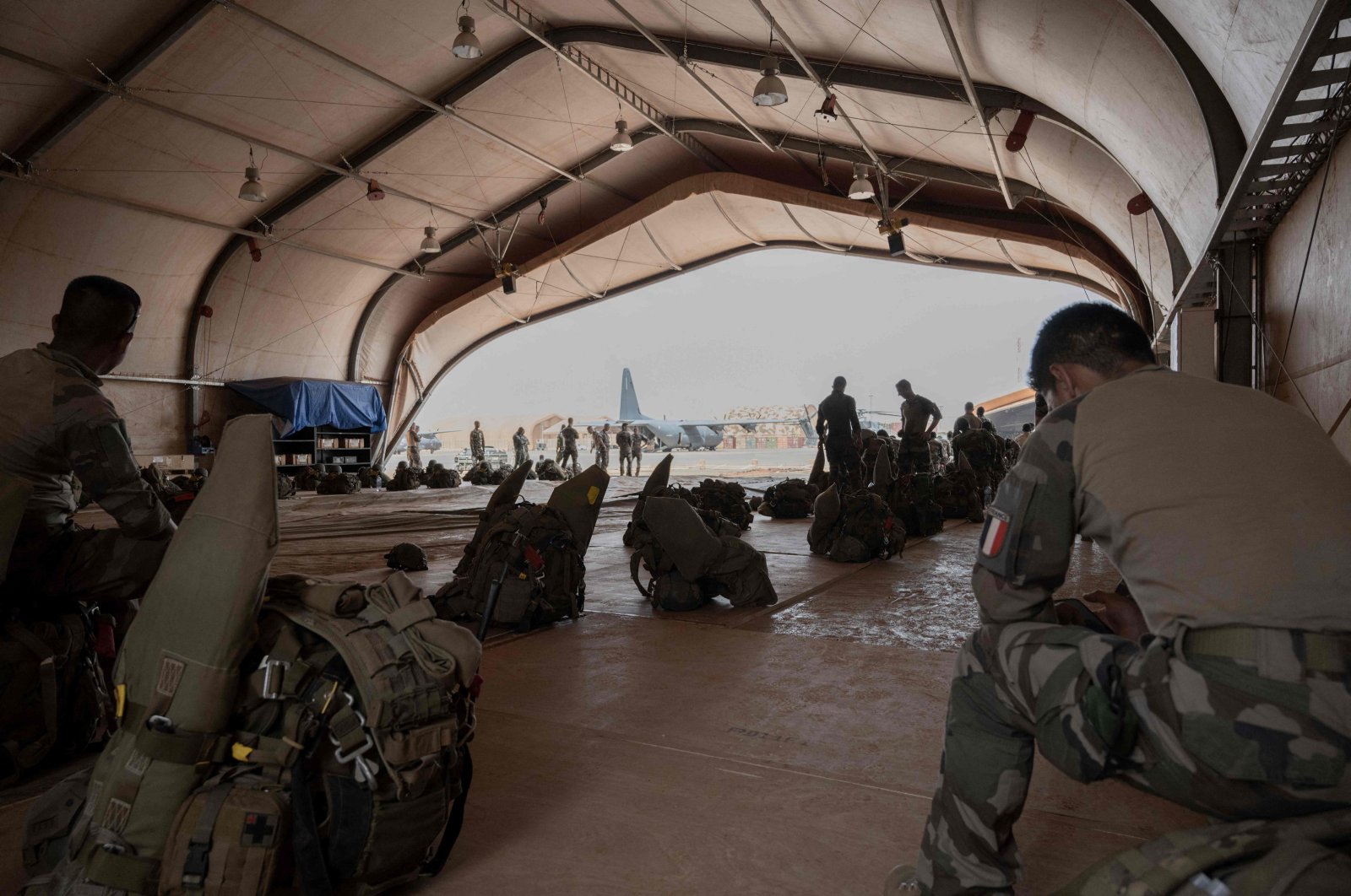 French and Nigerien soldiers prepare for a mission at the French BAP air base, in Niamey, Niger, May 14, 2023. (AFP Photo)