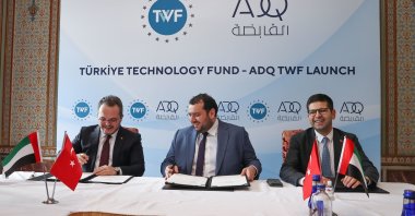 From left, TWF CEO Arda Ermut, ADQ CEO Mohamed Hassan Alsuwaidi, and Investment Office head Ahmet Burak Dağlıoğlu during a launching ceremony of the Türkiye Technology Fund, in Istanbul, Türkiye, March 23, 2022. (AA Photo)