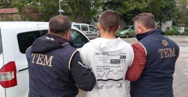 Turkish police escort a Daesh suspect captured in Samsun, northern Türkiye, Oct. 2, 2023. (İHA Photo)