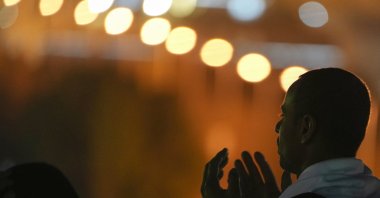 A Muslim pilgrim prays on the rocky hill known as the Mountain of Mercy, on the Plain of Arafat, during the annual Hajj pilgrimage, near the holy city of Mecca, Saudi Arabia, June 27, 2023. (AP Photo)