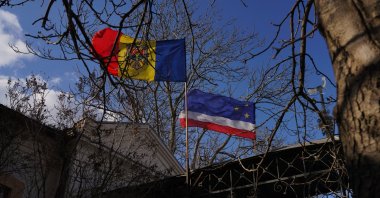 Moldovan and Gagauz flag fly on a building, Comrat, Moldova, March 17, 2022. (Getty Images Photo)
