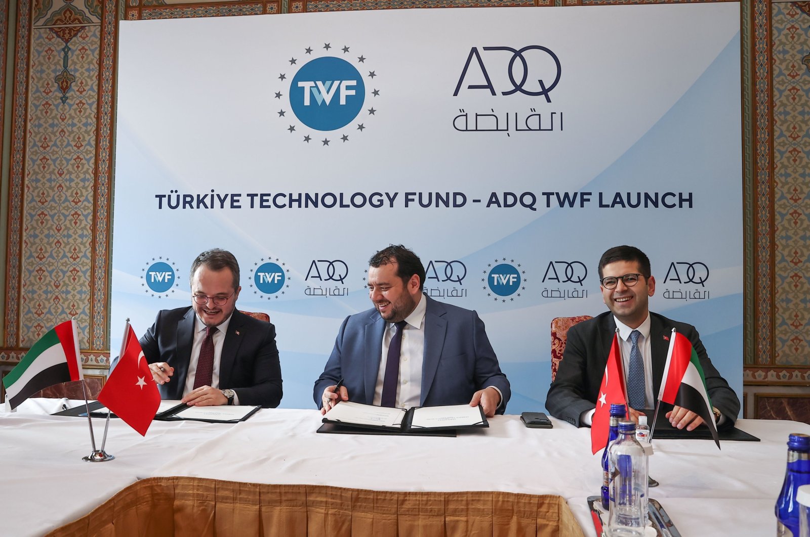 From left, TWF CEO Arda Ermut, ADQ CEO Mohamed Hassan Alsuwaidi, and Investment Office head Ahmet Burak Dağlıoğlu during a launching ceremony of the Türkiye Technology Fund, in Istanbul, Türkiye, March 23, 2022. (AA Photo)