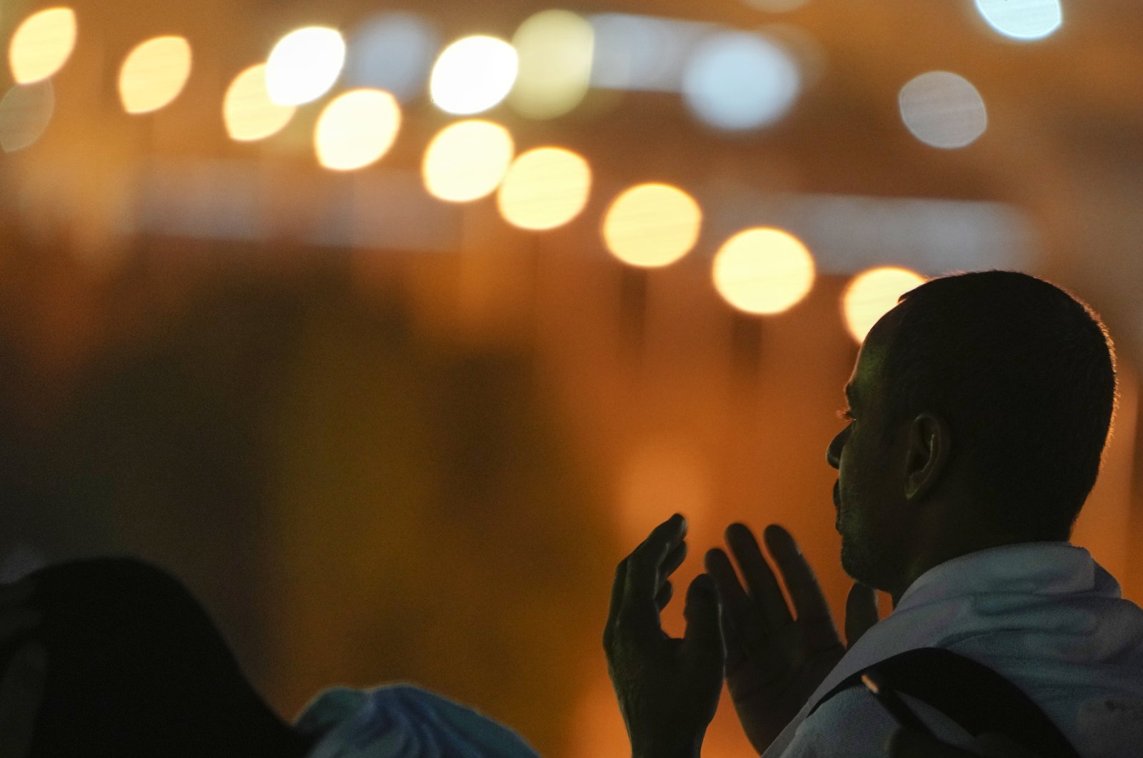 A Muslim pilgrim prays on the rocky hill known as the Mountain of Mercy, on the Plain of Arafat, during the annual Hajj pilgrimage, near the holy city of Mecca, Saudi Arabia, June 27, 2023. (AP Photo)