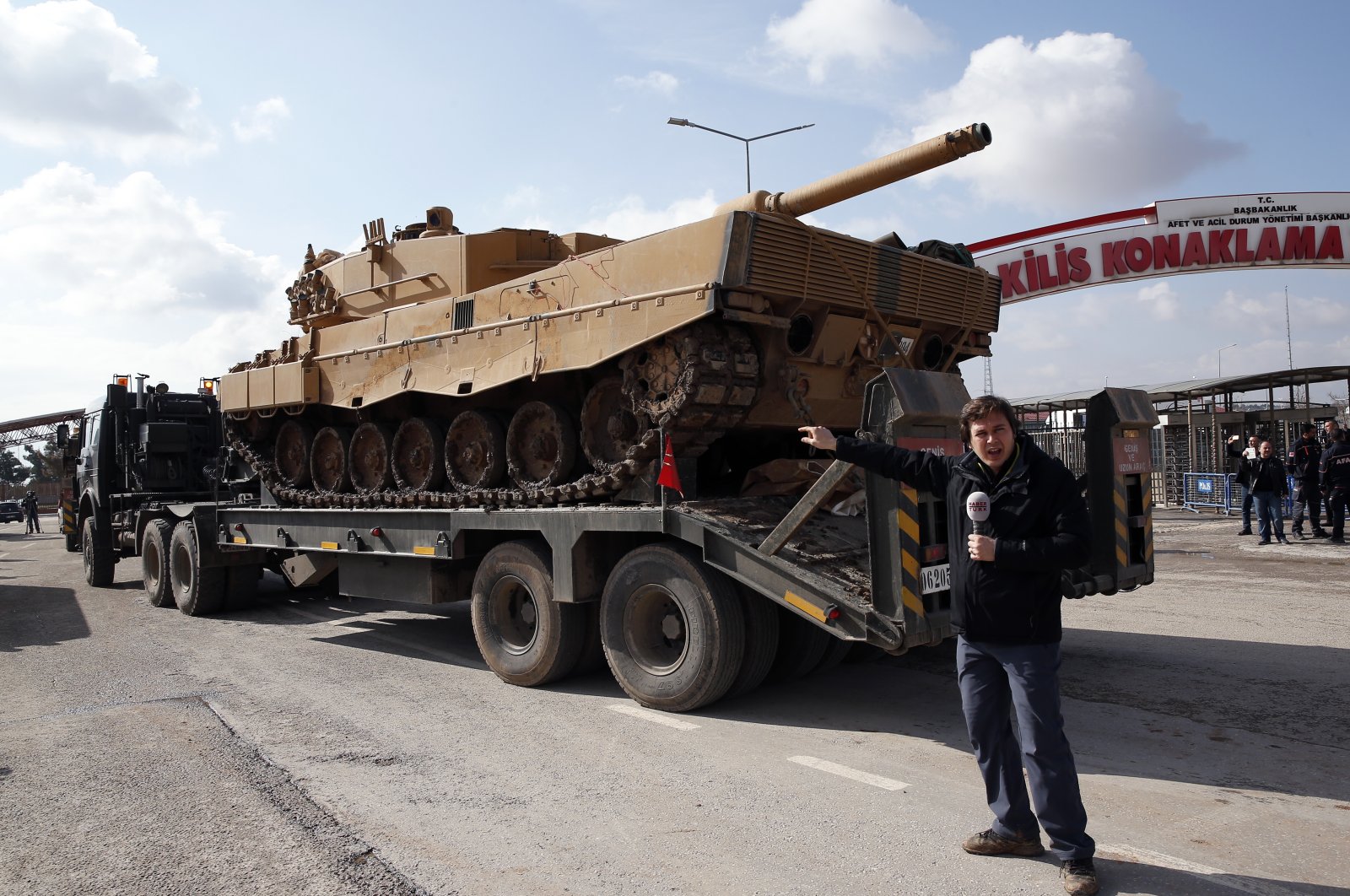 Turkish army tanks cross the Öncüpınar border gate to enter Syria, in Kilis, Türkiye, Saturday, Jan. 27, 2018. (AP File Photo)