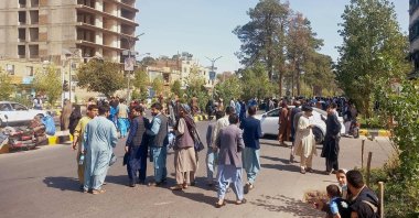 People gather on the streets in Herat following triple quakes, Oct. 7, 2023. (AFP Photo)