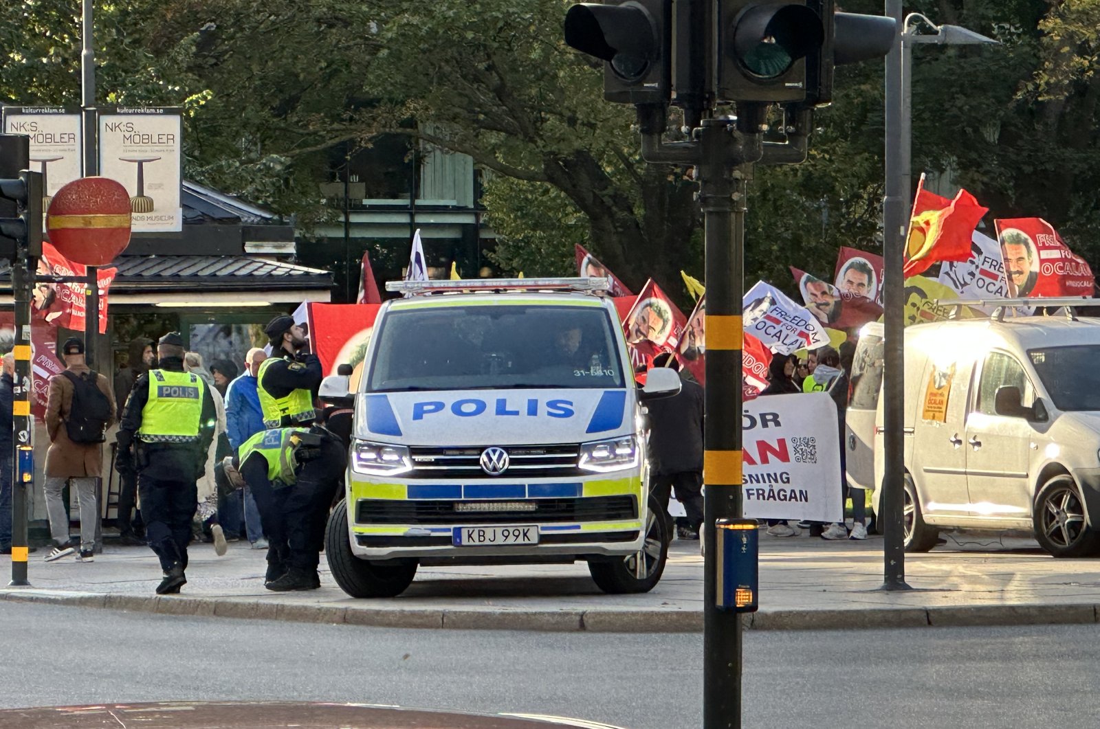 PKK/YPG supporters wave flags of the terrorist group as they march to the Swedish Parliament under police supervision in Stockholm, Sweden, Oct. 7, 2023. (AA Photo)