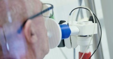 A patient recovering from long COVID-19 has his lung function measured in a lung test in a rehabilitation clinic. (dpa Photo)