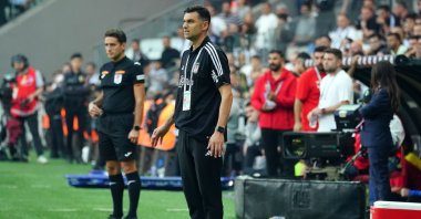 Beşiktaş interim coach, Burak Yılmaz, watches on during the Süper Lig match against Istanbulspor, Istanbul, Türkiye, Oct. 8, 2023. (IHA Photo)