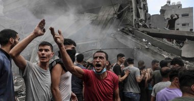 Palestinians search for survivors after an Israeli airstrike on buildings in the refugee camp of Jabalia, the Gaza Strip, Palestine, Oct. 9, 2023. (AFP Photo)
