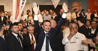 Özgür Çelik greets the crowd after being elected chair of the Republican People's Party's (CHP) Istanbul office at intraparty voting in Istanbul, Türkiye, Oct. 8, 2023. (AA Photo)