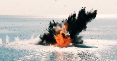 A ship explodes after being struck by Türkiye's unmanned surface vessel Albatros-S in a sea trial off Mersin, southern Türkiye, Oct. 9, 2023. (AA Photo)