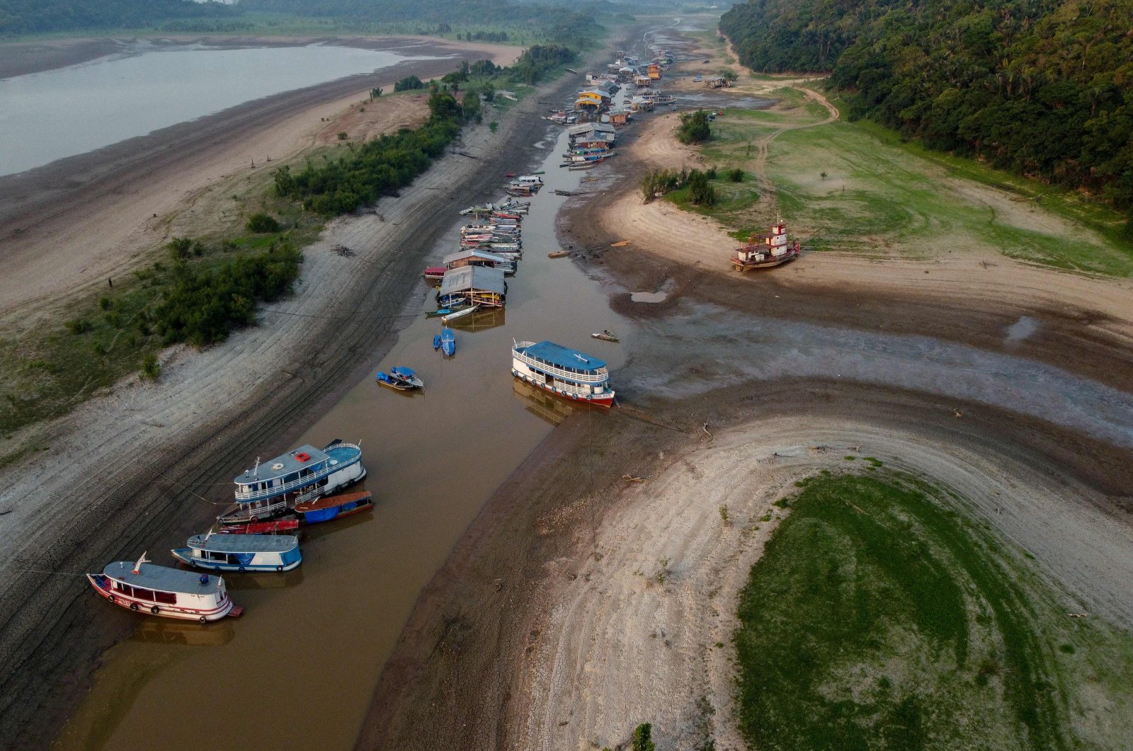 Aerial view of stranded and floating boats at Puraquequara Lake in Manaus, Amazonas State, Brazil, Oct. 6, 2023. (AFP Photo)