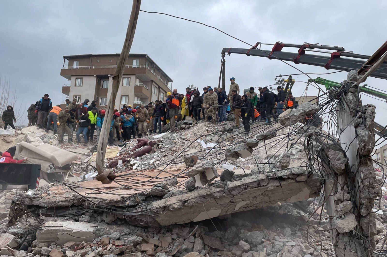 Rescuers search for survivors under the rubble following an earthquake in Kahramanmaraş, central Türkiye, Feb. 6, 2023. (AA Photo)